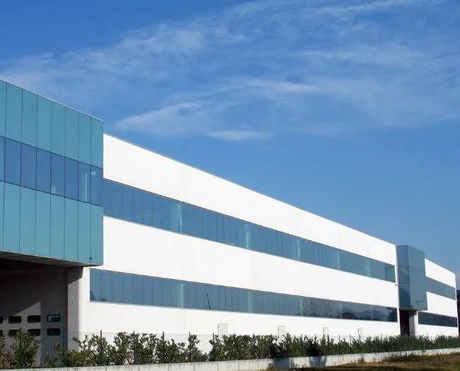 Modern industrial building under blue sky