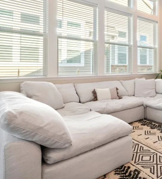 Spacious, light-filled living room corner