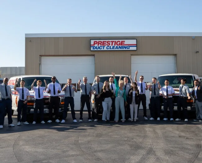 Prestige Duct Cleaning Staff Standing Outside The Office In Whitby