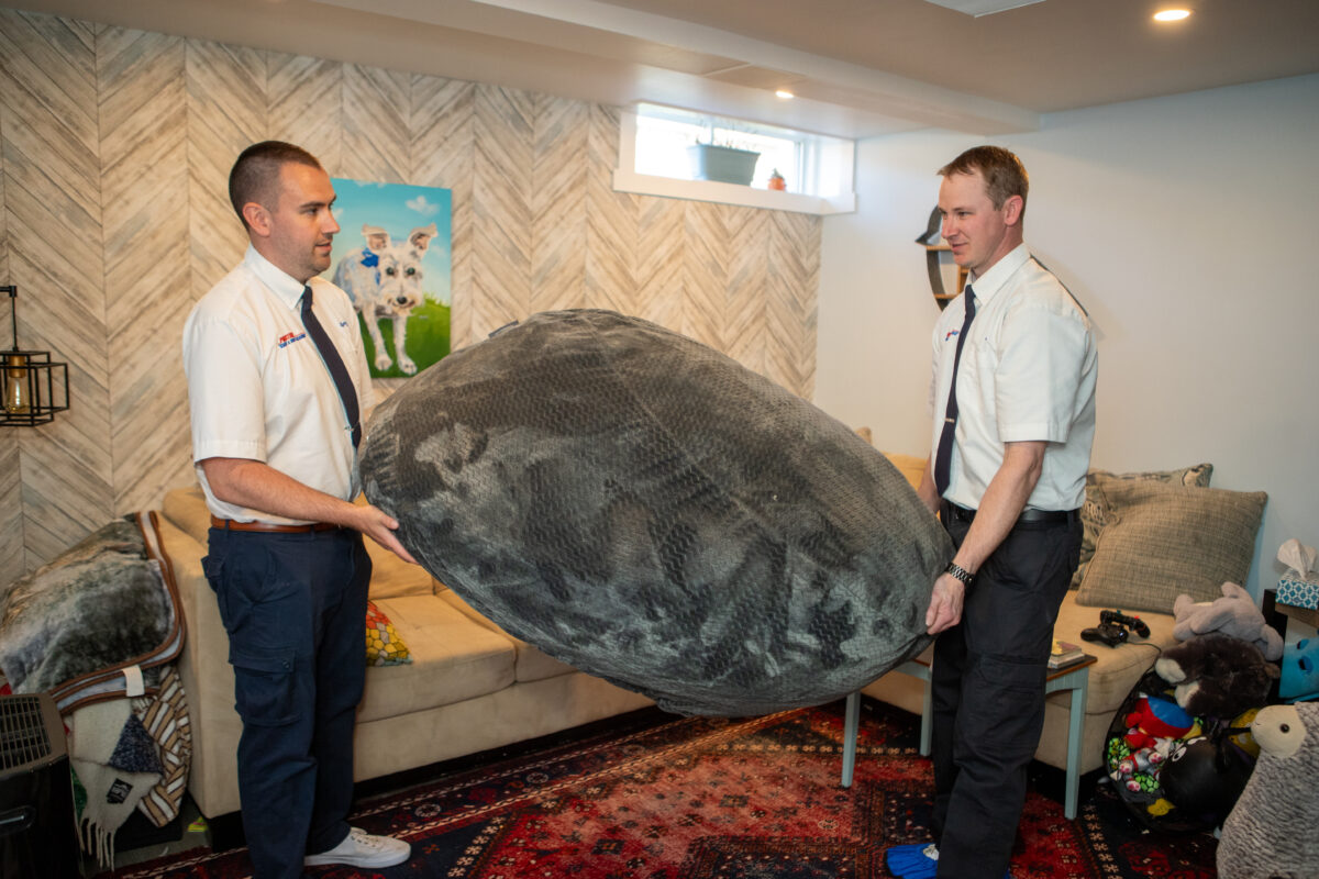 prestige carpet cleaners moving furniture ★ Prestige Carpet Cleaning Prestige Carpet Cleaning technicians moving furniture before cleaning a rug in a home in Durham