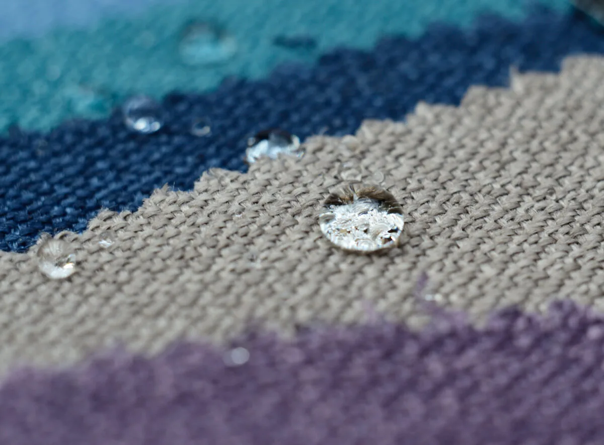 water absorption rug material identification test ★ Prestige Carpet Cleaning Drop of water on area rug as part of Water Absorption Test for rug material identification